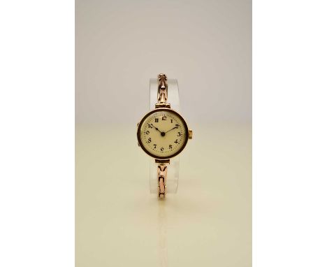 A lady's 9ct gold bracelet watchDate: Circa 1921Movement: 15-jewel manualDial: Matt silver, black Arabic hour markers, blued 