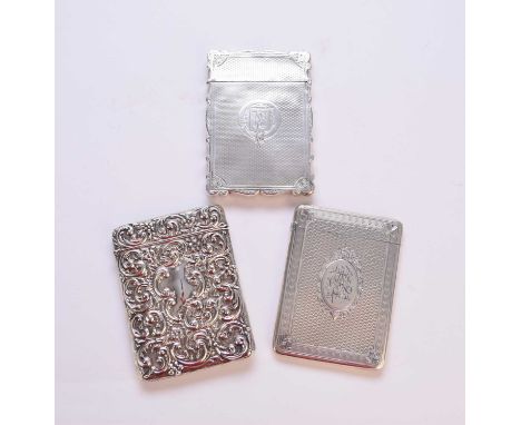 A Victorian silver card case, George Unite, Birmingham 1891, with engine turned decoration, 9.5cm high, together with a furth