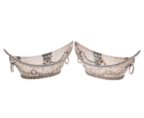 A pair of Edward VII silver navette-shaped baskets, maker I S Greenburg & Co Birmingham, 1901: crested, with gadrooned rims, 