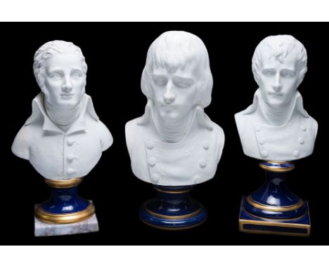 Three French bisque portrait busts: two of Napoleon Bonaparte and one other,  each in the white on blue glazed and gilt embel