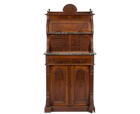 A late 19th/early 20th Century walnut dental cabinet:, with burr figured panels, the superstructure with a moulded three quar
