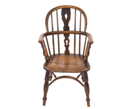 A child's 19th Century elm, ash and beechwood stick back Windsor elbow chair:, the back with a pierced central splat, having 