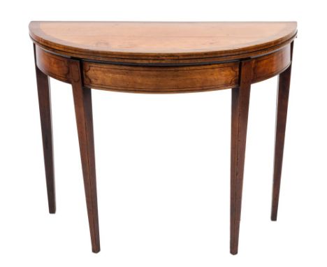 A George III mahogany, satinwood and inlaid half round card table:, bordered with ebony and boxwood lines, the satinwood and 