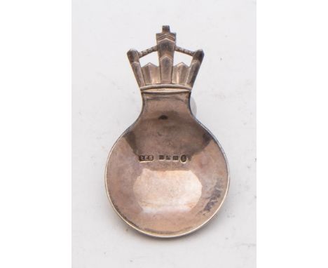 A George V hammered silver jubilee caddy spoon, maker Robert Edgar Stone, London, 1934: of circular form, the handle in the f