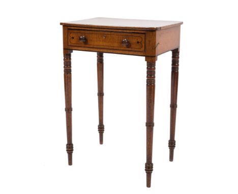 A Regency mahogany and inlaid rectangular work table:, bordered with ebonised lines, the top with fleur de lys motifs to the 