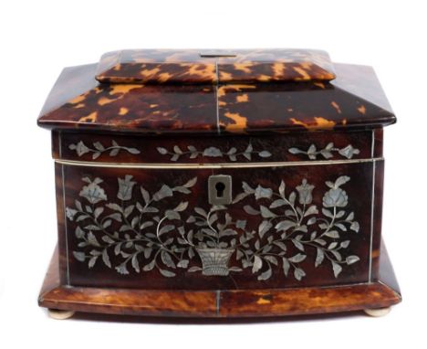 A 19th Century mother of pearl inlaid and blonde tortoiseshell tea caddy: of bowed outline, with shallow domed hinged top enc