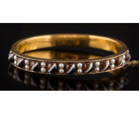 A 19th century banded agate bead and seed pearl hinged bangle: with nine banded agate beads each approximately 5.5mm diameter