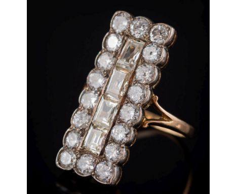 A diamond and step-cut diamond, rectangular panel cluster ring: the central row of step-cut diamonds within a border of old b