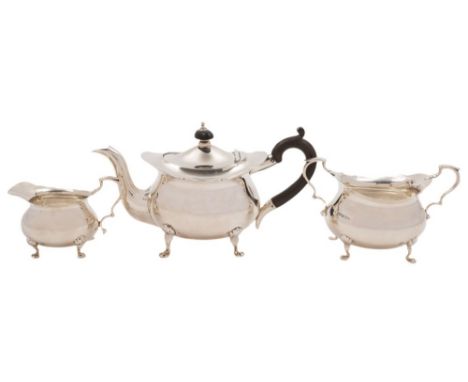 An Edward VII matched silver three-piece bachelor's tea service, maker Walker & Hall, Sheffield, 1908, and Chester 1906: of b