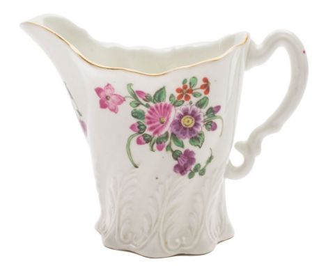 A First Period Worcester 'High Chelsea' ewer: of spiral leaf moulded form with ornate scroll handle, painted with puce and br