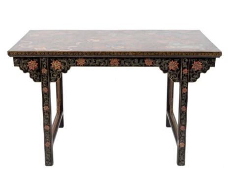 A Chinese black lacquer and decorated altar table:, with  all over profuse ornament of dragons, lion dogs and scrolling flora