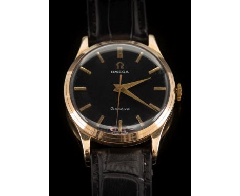 Omega - A gentleman's 'Omega' 9ct gold cased, manual wristwatch: the black dial with baton markers, the winder with 'Omega' e