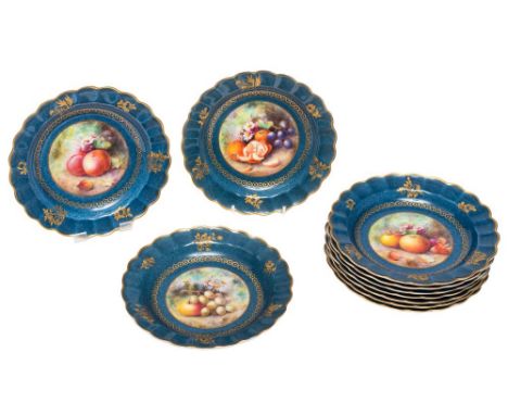 A Royal Worcester fruit painted porcelain part service: with scalloped rims, painted by Harry Martin with bunches of fruit an