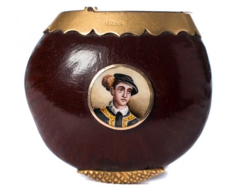 An unusual late Victorian/Edwardian 15ct gold mounted nut vesta case: set with a circular enamel portrait to one side, 4 x 5 