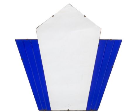 An Art Deco style wall mirror:, of kite shape with plain centre and blue tinted fluted wings, 66cm (2ft 2in) x 63.5cm (2ft 1i