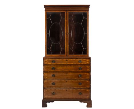 An early 19th Century mahogany and inlaid secretaire bookcase:, crossbanded in tulipwood and bordered with chequer decorated 