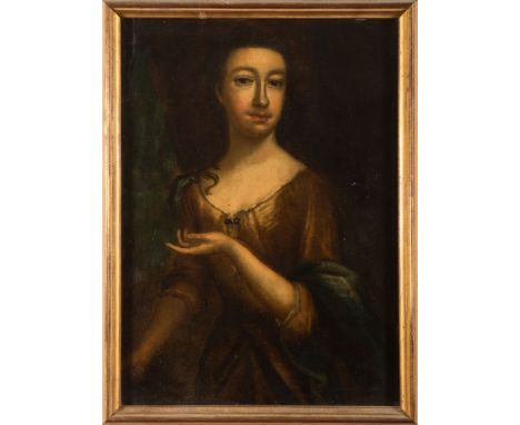 Circle of Godfrey Kneller [1646-1723]-A portrait of a lady, half-length standing,:-with long dark hair and grey eyes,wearing 