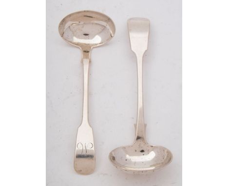 A Victorian provincial silver Fiddle pattern sauce ladle, maker Philip Osment, Exeter, 1861: together with a near matching sa