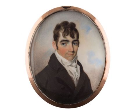 Circle of Thomas Richardson [1771-1837]-A miniature portrait of a young man, bust-length, with short wavy hair and blue eyes,