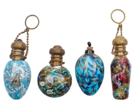 Four coloured glass scent bottles and stoppers: each of either scrambled millefiori form or with foil inclusions, three decor