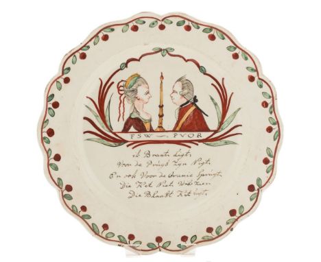A Dutch-decorated Leeds creamware plate: of silver shape, painted in green, red, yellow and black enamels with a double portr