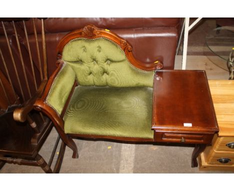 AN UPHOLSTERED TELEPHONE TABLE 