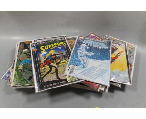 A SELECTION OF MARVEL AND DC COMICS. TO INCLUDE SUPERMAN, XMEN, SPIDERGIRL, SUPERGIRL, ETC 