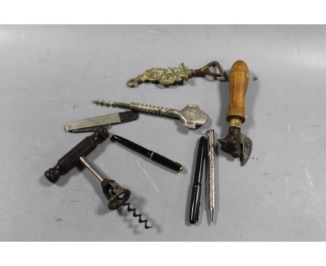 A QUANTITY OF VINTAGE BOTTLE OPENERS AND PENS, ETC 