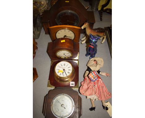 Three 20th Century mantel clocks, various; a ship's style wall clock; and an aneroid barometer in oak case a doll and ornamen
