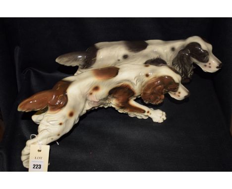 A pair of ceramic ornaments modelled as a pair of setters.