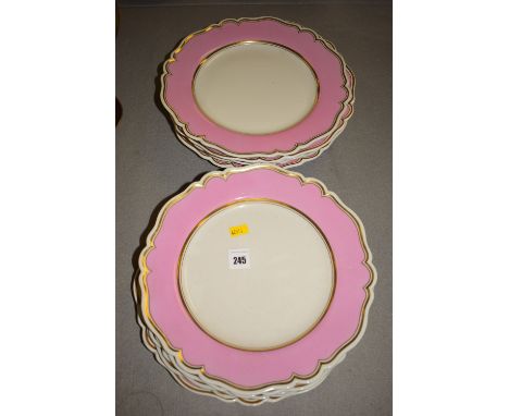 Ten Flight, Barr & Barr dinner plates of shaped form with pink borders and gilt decoration, mark reading Royal Porcelain Work