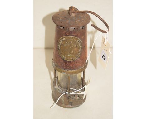 The Protector Lamp & Lighting Co., a type SL miners lamp.