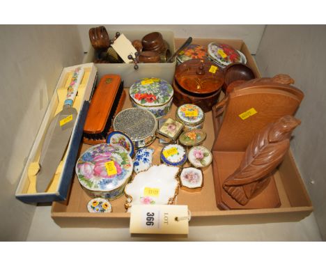 A pair of wooden book ends with mounted eagles; a selection of small enamel and ceramic boxes; wooden serviette rings; knife 