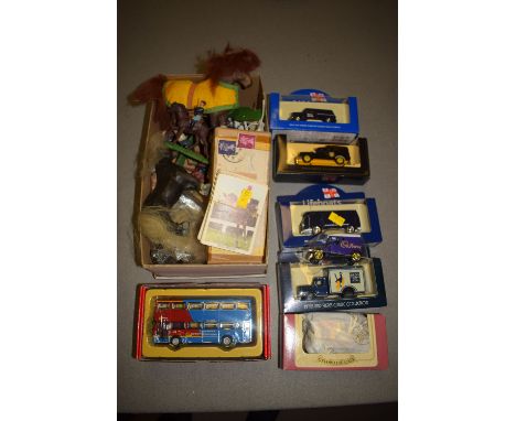 A small collection of modern die-cast model vehicles, in original boxes; plastic soldiers; confectionery cards; and sundries.