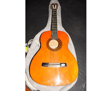 A modern acoustic guitar with a paper label inside inscribed 'Valencia, 1972', model CG160 3/4, serial no. 5101050. with a ca