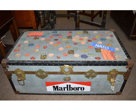 A 20th Century metal trunk with metal edges and brass catches.