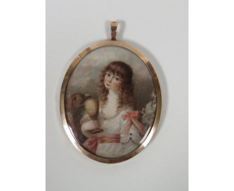 An oval miniature portrait on ivory of young girl with brown curly hair and bird drinking from a goblet, monogrammed C.B. 178