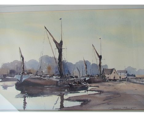 GRAHAM HOWLETT (20th Century): A framed and glazed watercolour "A Suffolk Boatyard". Signed bottom right. 34cm x 54.5cm