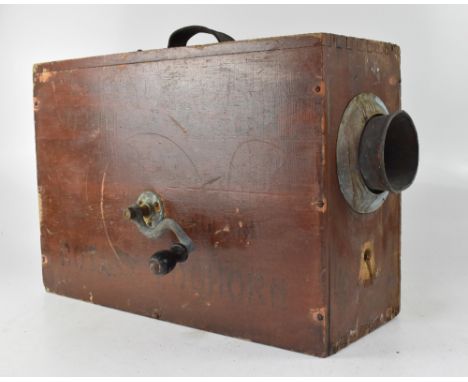 An English made stained pine cased Norwegian pattern rotary foghorn, 37.5 x 55cm. CONDITION REPORT Knocks to the cases, losse