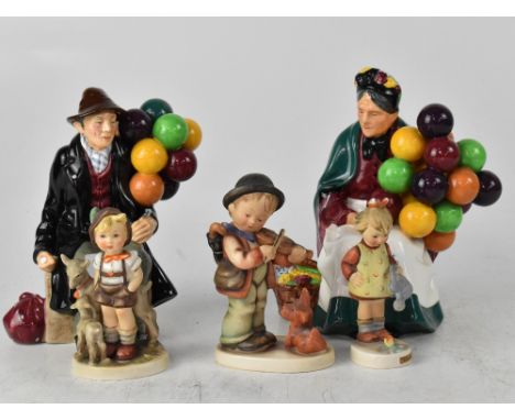 Two Royal Doulton figures, HN1954 'The Balloon Man' and HN1315 'The Old Balloon Seller', a Royal Doulton bowl decorated with 