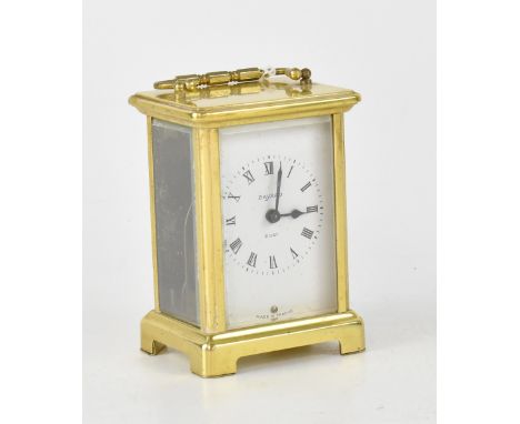 A French Bayard eight-day brass carriage clock, the white dial set with Roman numerals, height 11cm. CONDITION REPORT Not tes