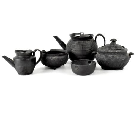 A group of four Wedgwood and other black basalt ceramics to include a teapot in the Oriental style and one smaller similar ex