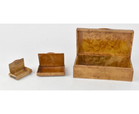 A Russian Karelian birch cigarette box, 17 x 9cm, of rectangular form, 8.5 x 6cm, a similar card case, and a smaller example,