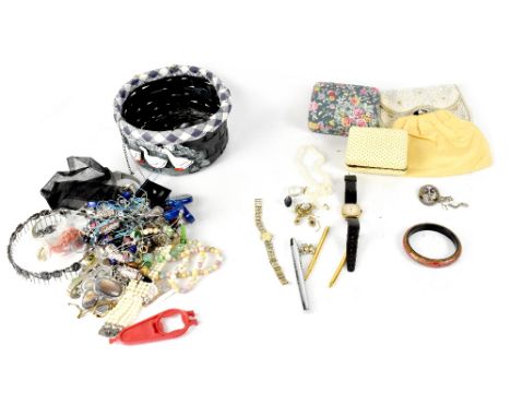 A quantity of costume jewellery to include evening bag, Scottish silver brooch, bead necklaces, dress pearls, a boxed Rotary 