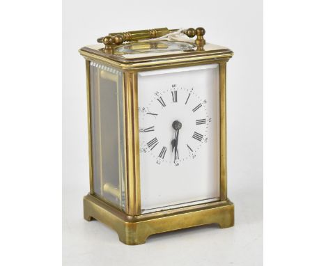 An early 20th century French brass carriage clock, the dial set with Roman numerals, height 11cm. CONDITION REPORT Not tested