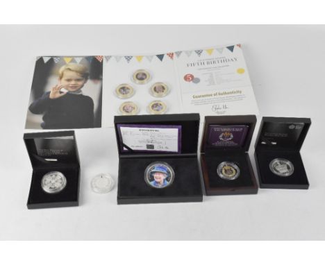 A 2015 'The Longest Reigning Monarch' £5 silver coin, proof, limited edition no.3996/15,000, a  'First Birthday of HRH Prince