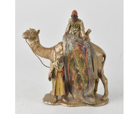 A Bergman-style cold painted spelter figure depicting a carpet seller on a camel, unsigned, height 19cm. CONDITION REPORT The