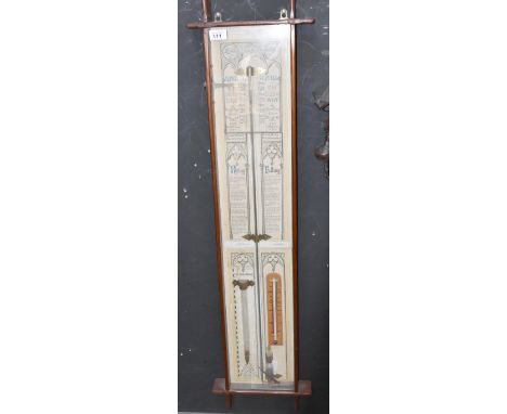 An oak-framed Admiral Fitzroy barometer, no.367 815, with two mercury thermometers within the glazed case, height 97cm.