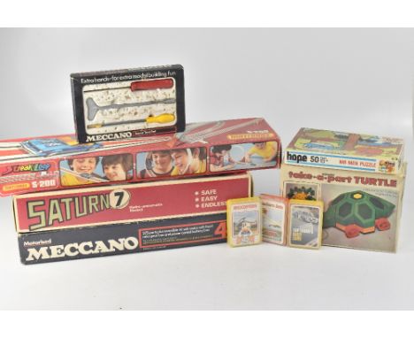 Various vintage toys to include a Meccano 4M motorised kit, two tin plate Tonka toys, a Matchbox S-200 Streak Loop, Saturn 7 