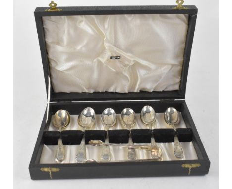 A set of twelve silver teaspoons, bright cut pattern with an oval bearing the initial 'R', Josiah Williams &amp; Co, also a s